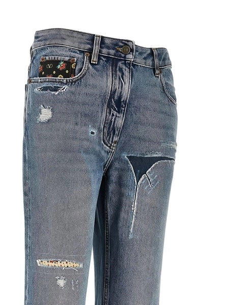 Jeans flare con inserti