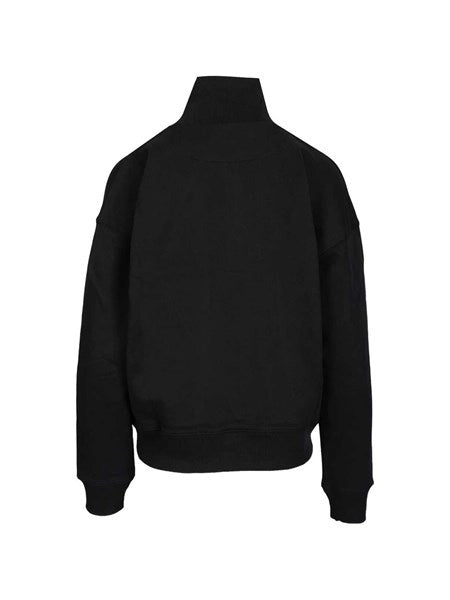 Felpa con mezza zip