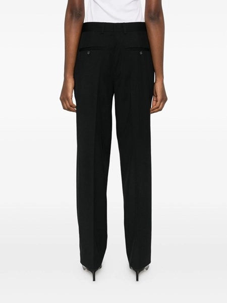 Pantaloni con pieghe