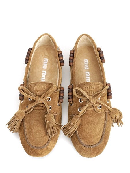 Scarpe "Deck" in pelle scamosciata con nappine