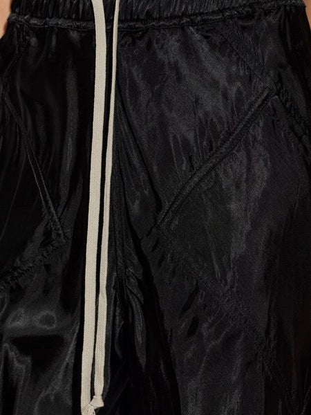 Pantaloni larghi con finitura lucida