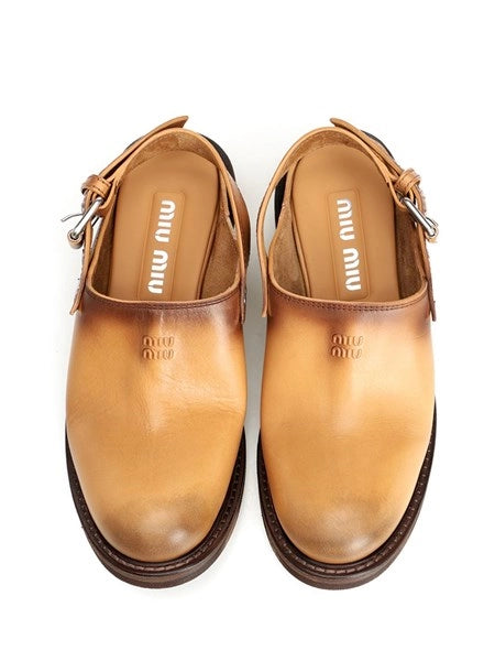 Mules in pelle