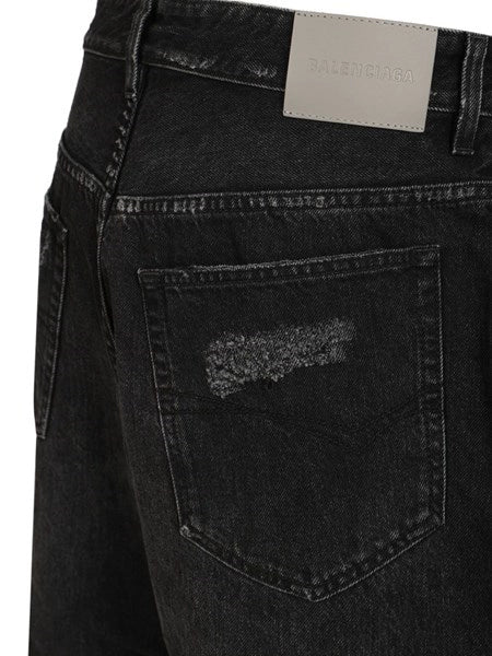 Jeans incurvati