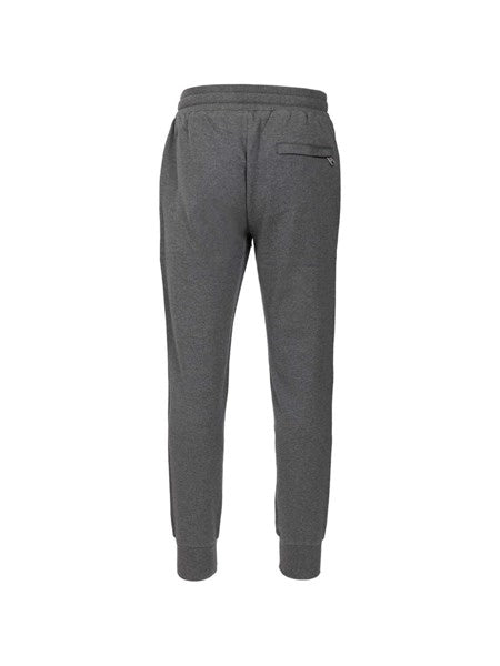 Pantaloni in jersey con patch araldico