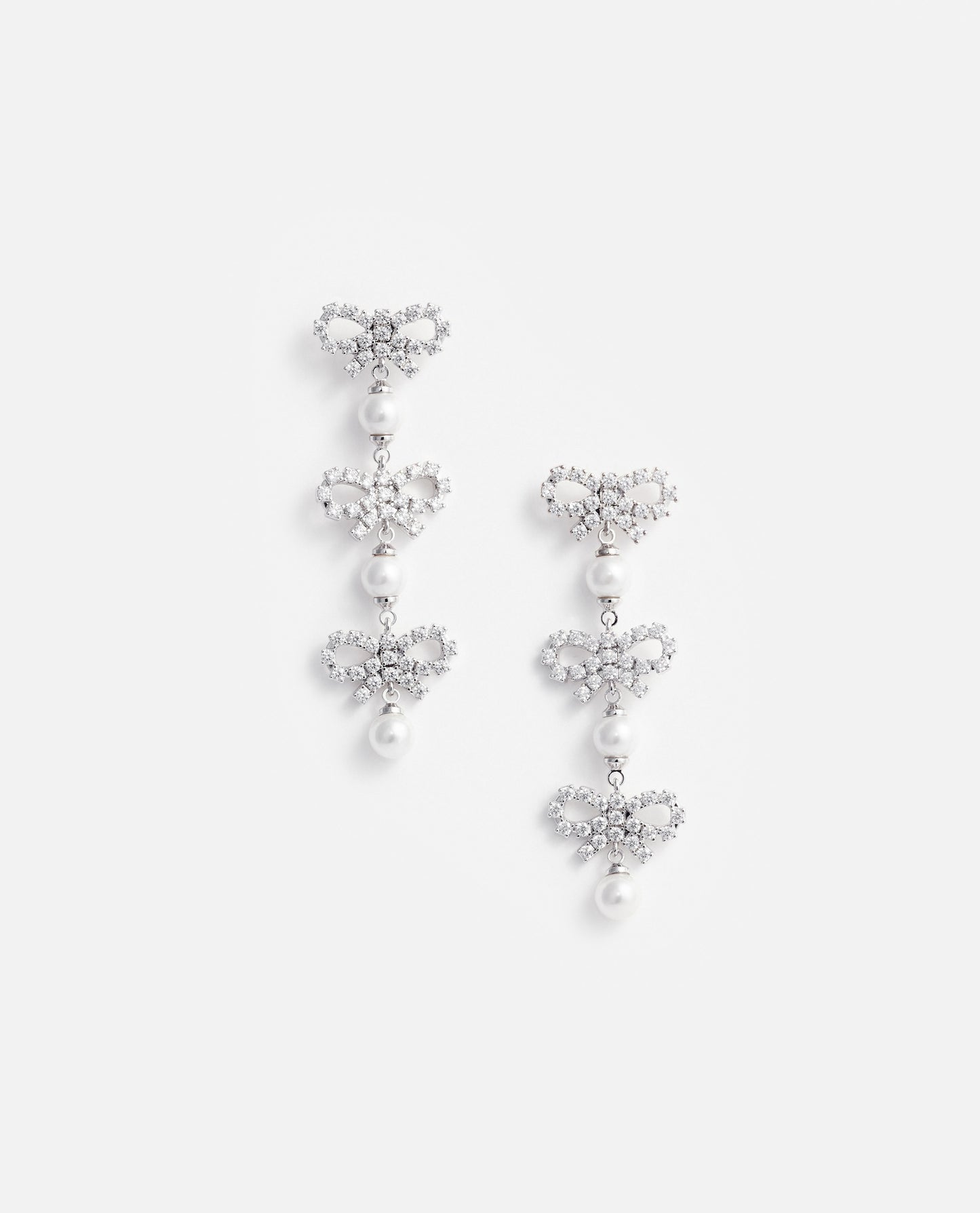 MICRO BOW PEARL TIERED EARRINGS