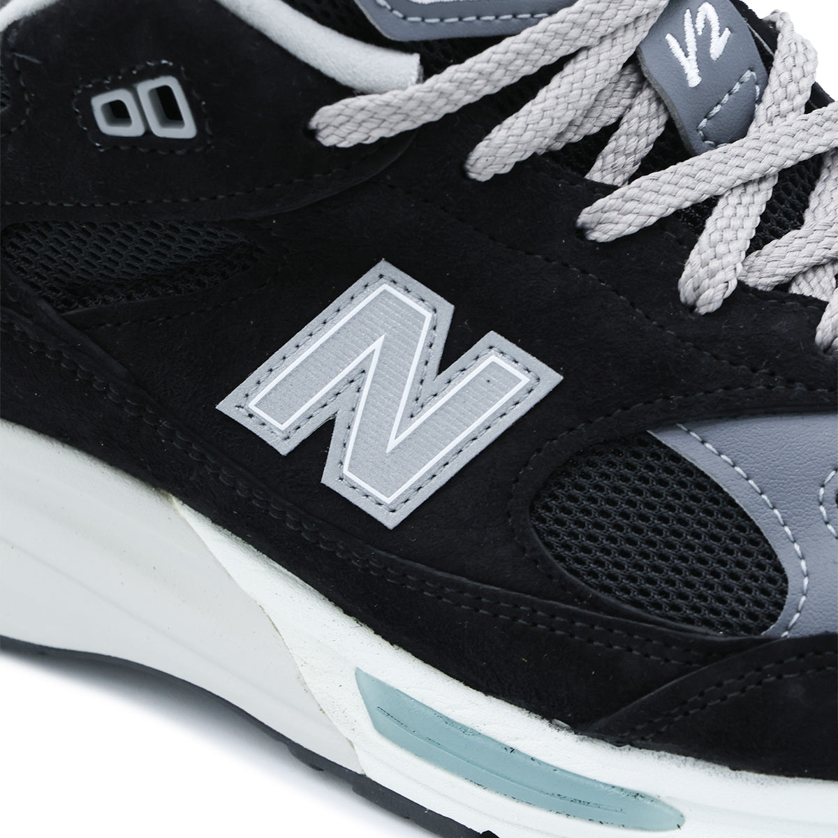 BLACK AND LIGHT BLUE SNEAKERS