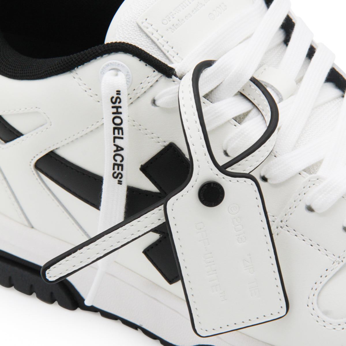 BLACK AND WHITE LEATHER OUT OF OFFICE SNEAKERS