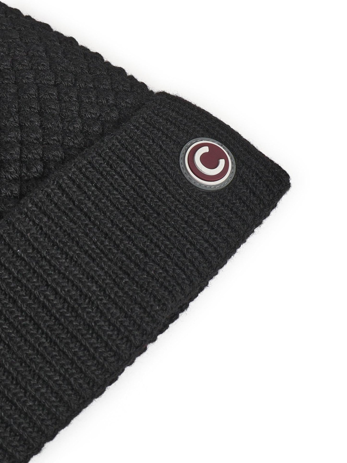 Cappello con pompon in pelliccia