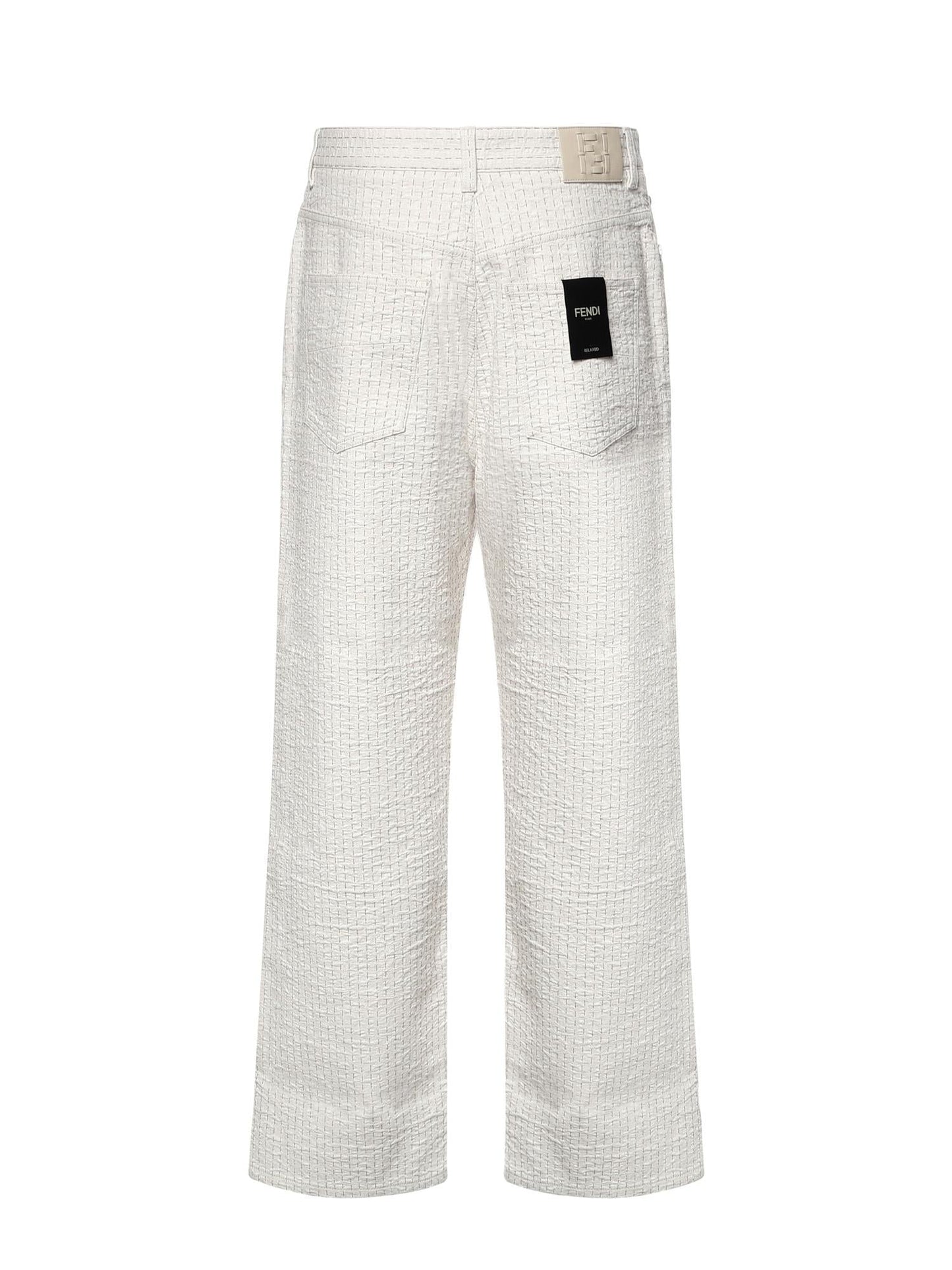 Jeans in denim con impunture