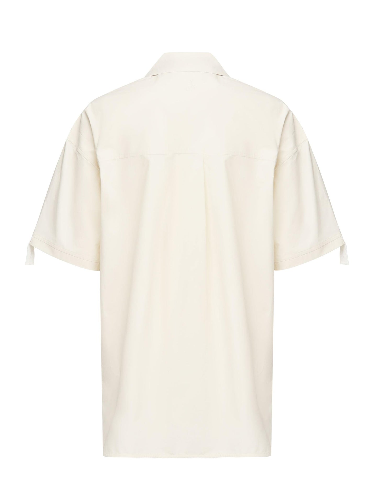 Polo con tasca trapuntata