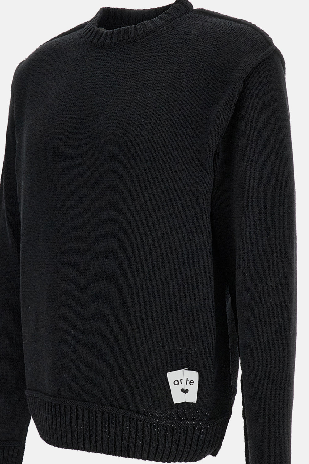REVERSIBLE LABEL KNIT