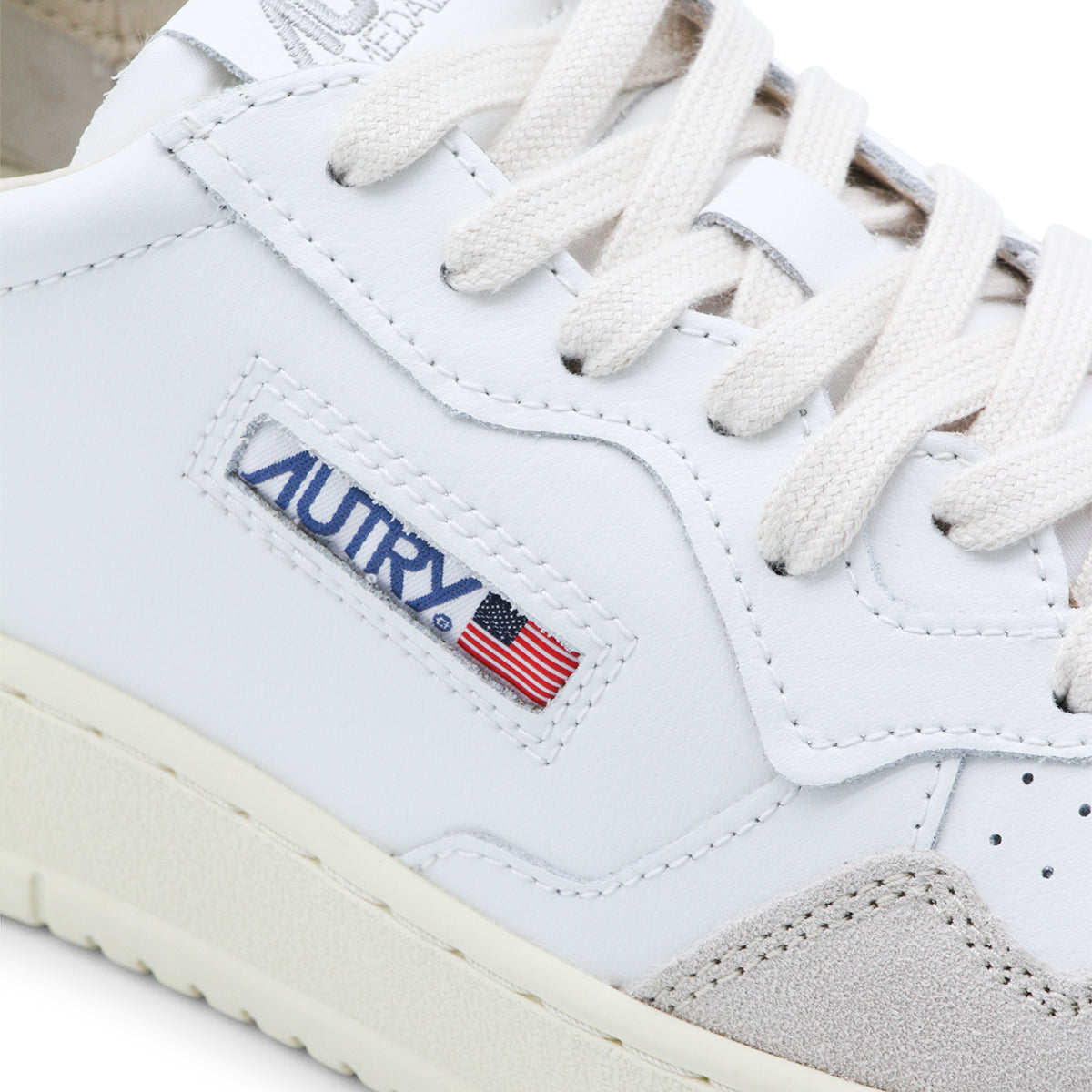 WHITE AND BLACK LEATHER SNEAKERS