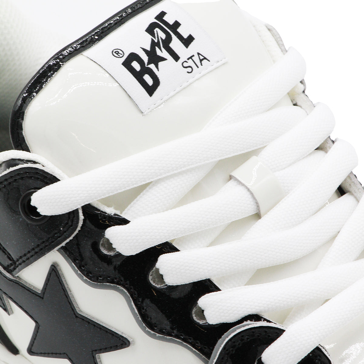 BLACK AND WHITE LEATHER SNEAKERS