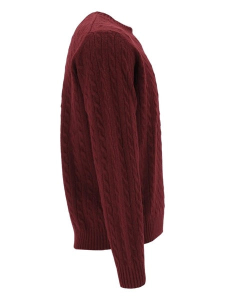 Pullover a trecce