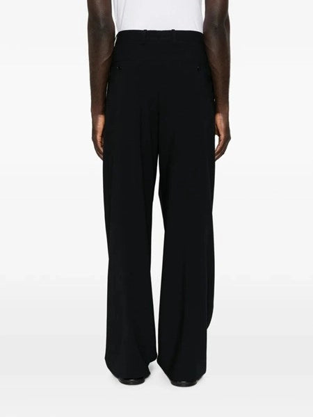 Pantaloni over in crepe di lana vergine con pences