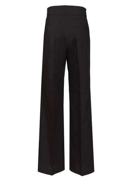 Pantalone con pieghe
