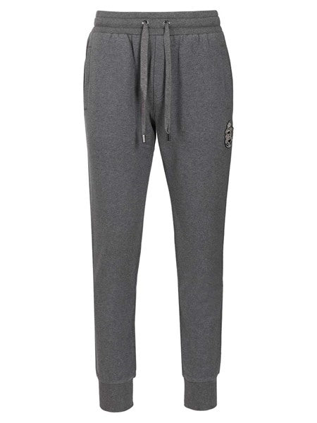Pantaloni in jersey con patch araldico