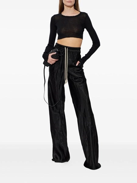 Pantaloni larghi con finitura lucida