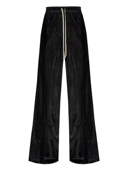 Pantaloni larghi con finitura lucida