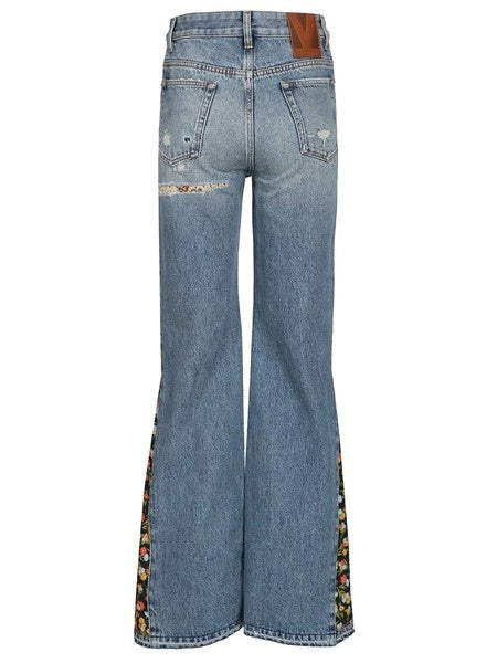 Jeans flare con inserti