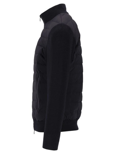 Piumino con maniche a maglia