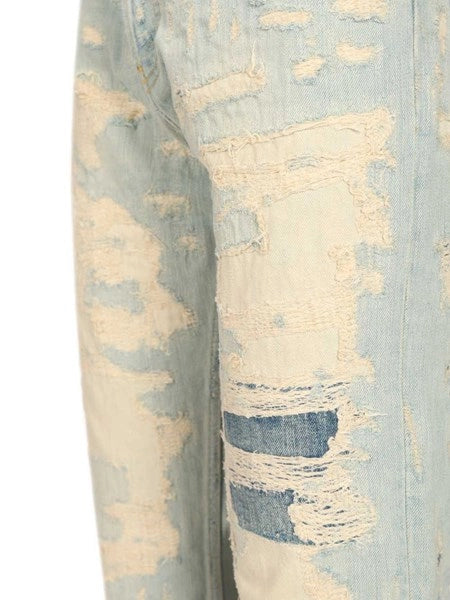 Jeans con effetto riparato - 2010M