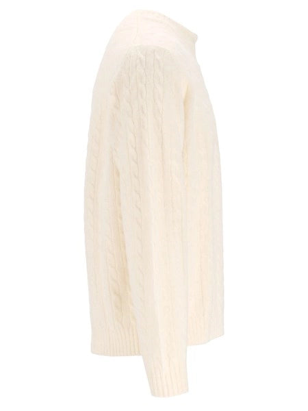 Pullover a trecce
