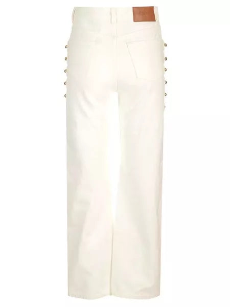 Jeans crop con borchie
