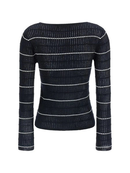 Maglia aderente in lana e set