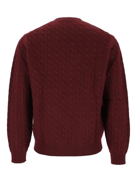 Pullover a trecce