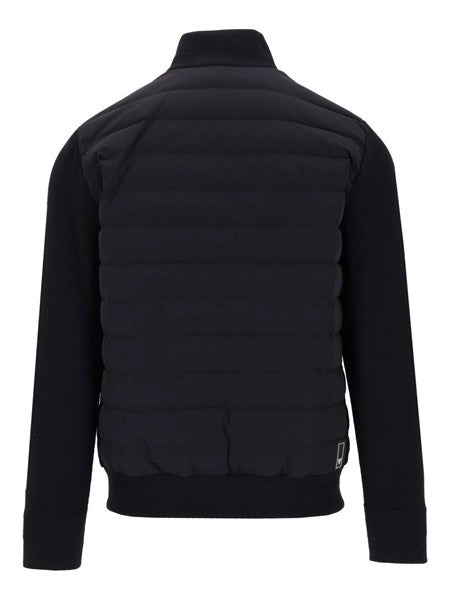 Piumino con maniche a maglia