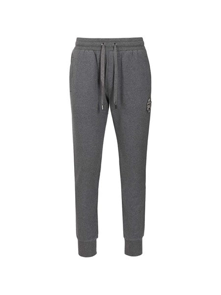 Pantaloni in jersey con patch araldico