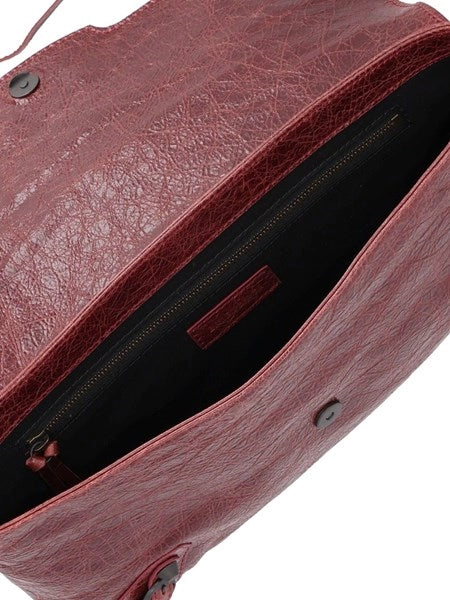 "Le city" clutch in pelle arena