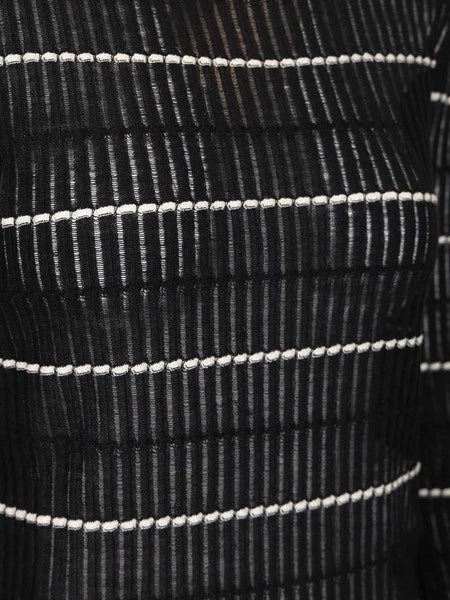 Maglia aderente in lana e set