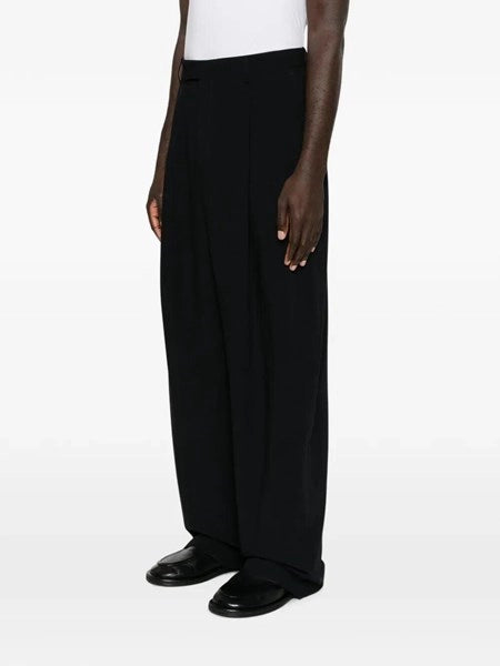 Pantaloni over in crepe di lana vergine con pences