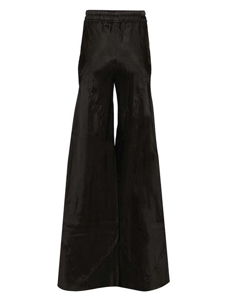 Pantaloni larghi con finitura lucida
