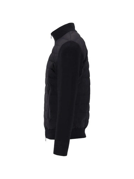 Piumino con maniche a maglia