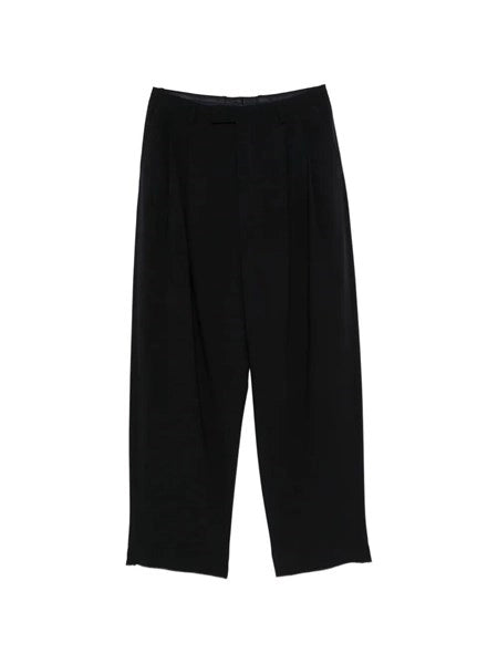Pantaloni over in crepe di lana vergine con pences