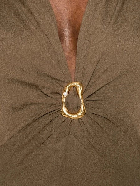 Abito fibbia scultura