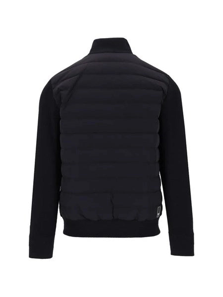 Piumino con maniche a maglia