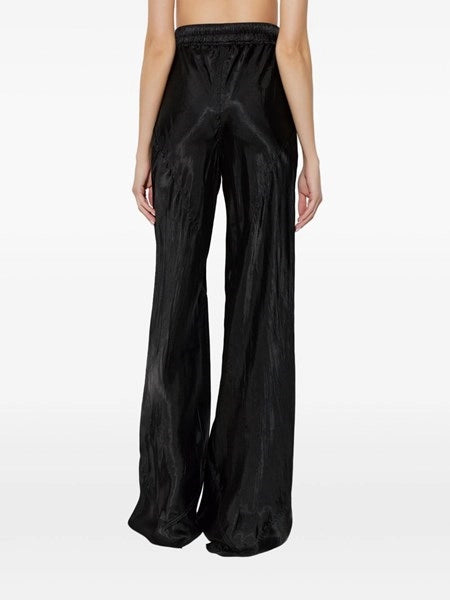Pantaloni larghi con finitura lucida