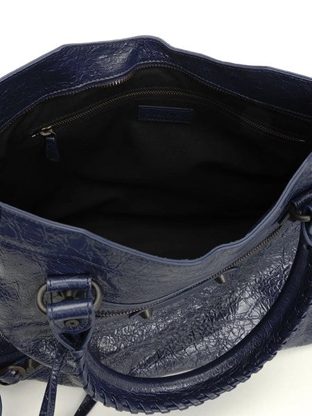 Borsa "Le City" Media