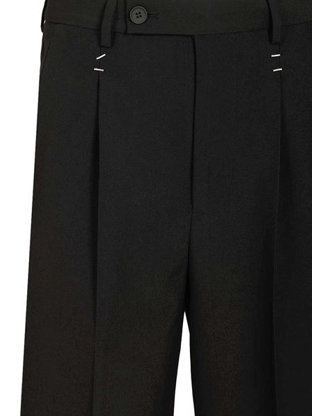 Pantaloni in misto lana con graffette