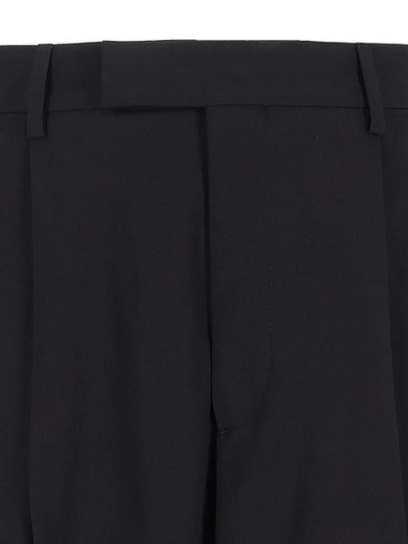 Pantaloni over in crepe di lana vergine con pences