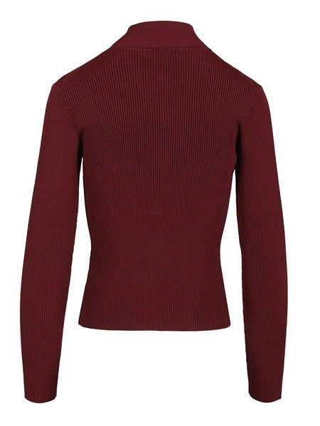 Top in maglia con apertura a chiave