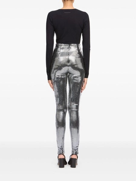 Pantaloni con paillettes metalliche