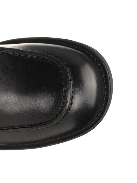 Mocassin con cuciture a vista