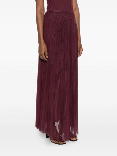 gonna in plissé elegante