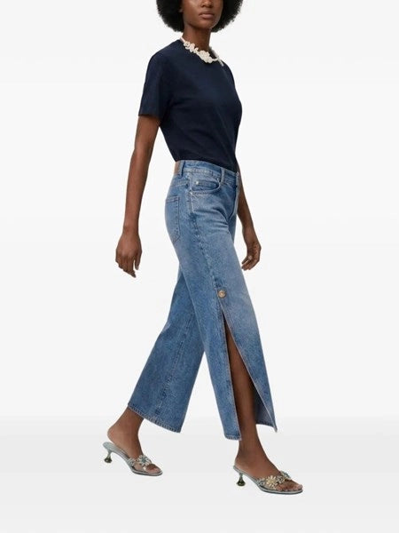 Pantaloni con spacco