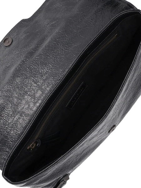 "Le city" clutch in pelle arena